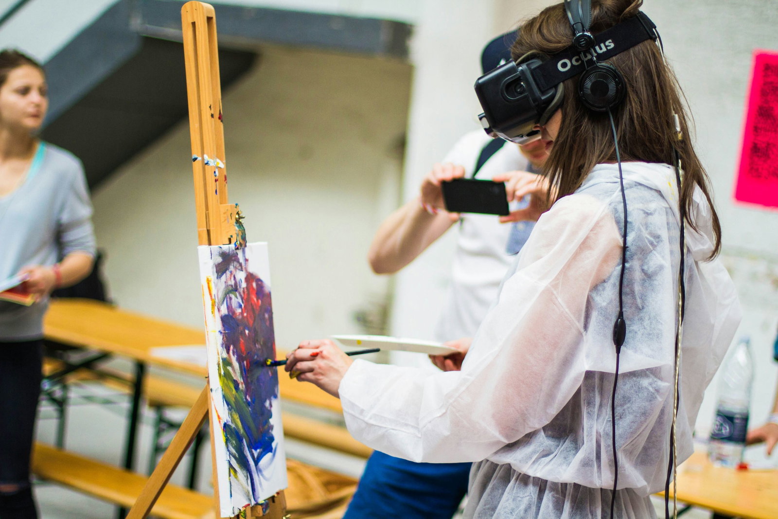 woman doing painting during daytime